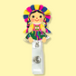 Muñequita Badge Reel